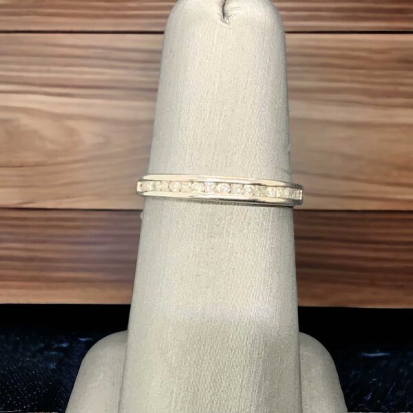 18kt Anniversary Band with Round and Princess Cut Stones