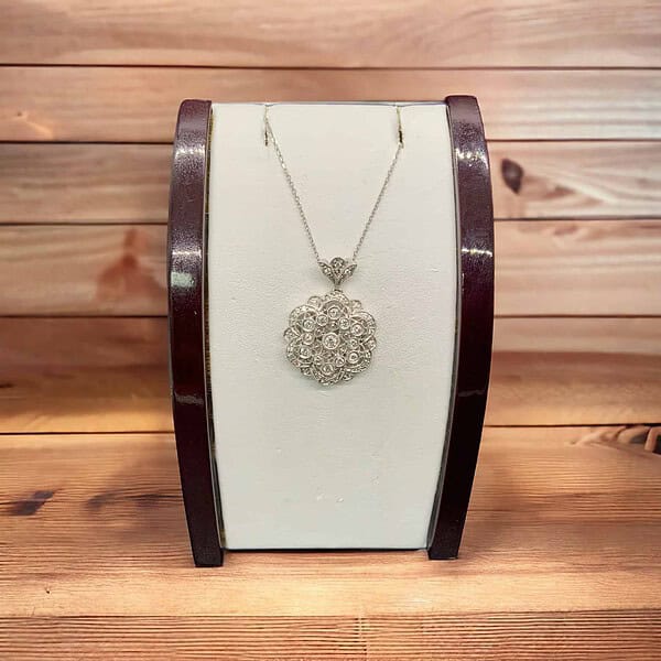 Diamond flower pendant Diamond Fashion Platinum Jewelers MS