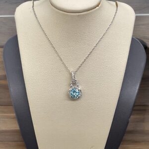 Blue Topaz Halo Pendant Blue Topaz Platinum Jewelers MS