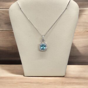 Blue Topaz Halo Pendant Blue Topaz Platinum Jewelers MS