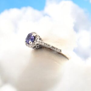 14kt White Gold Halo Ring with Tanzanite and Diamond Rounds Tanzanite Platinum Jewelers MS