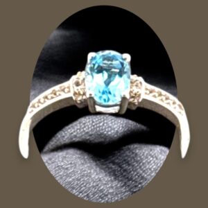 1.02 Carat Swiss Blue Topaz with White Topaz Accent Stones in Oval Center Design Sterling Silver Ring Blue Topaz Platinum Jewelers MS