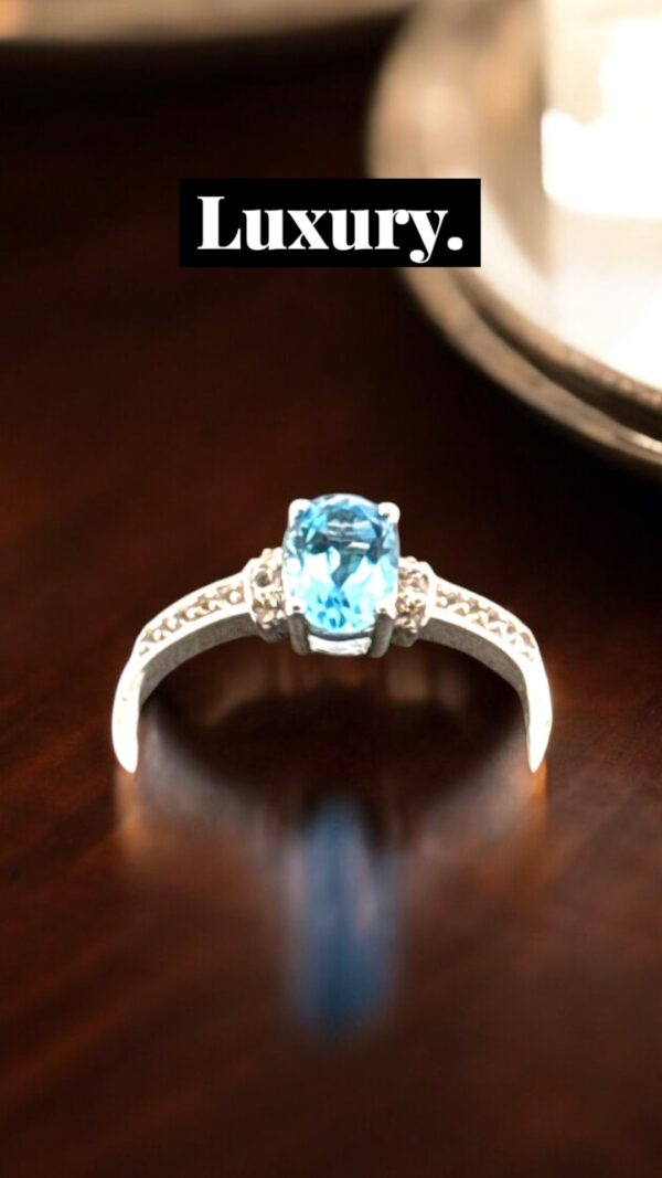1.02 Carat Swiss Blue Topaz with White Topaz Accent Stones in Oval Center Design Sterling Silver Ring - Image 4