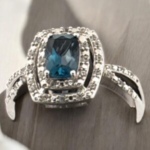 London Blue Topaz Center Stone with White Zircon Halo Design in Sterling Silver Blue Topaz Platinum Jewelers MS