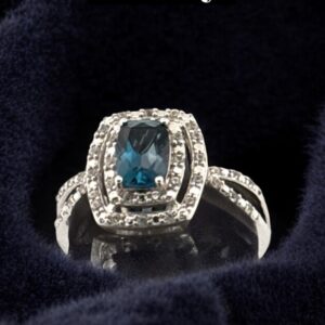 London Blue Topaz Center Stone with White Zircon Halo Design in Sterling Silver Blue Topaz Platinum Jewelers MS