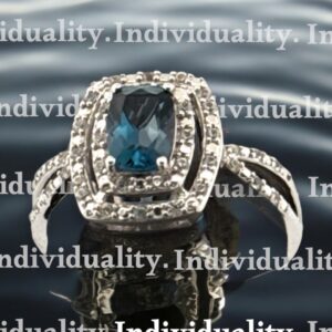 London Blue Topaz Center Stone with White Zircon Halo Design in Sterling Silver Blue Topaz Platinum Jewelers MS