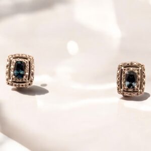 London Blue Topaz Center Stone with White Zircon Halo Design in Sterling Silver Blue Topaz Platinum Jewelers MS