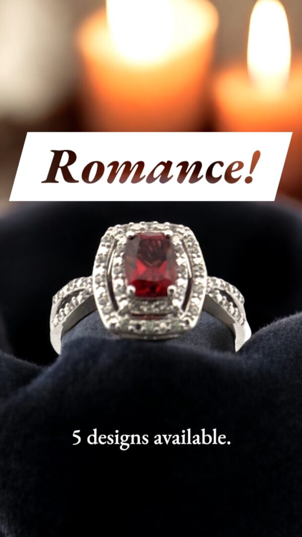 Garnet Center Stone with White Zircon Halo Design in Sterling Silver
