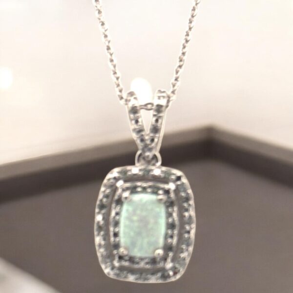 Opal Center Stone with White Zircon Halo Design in Sterling Silver - Image 4