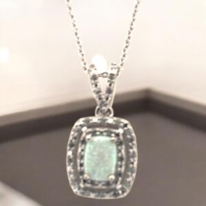 Opal Center Stone with White Zircon Halo Design in Sterling Silver Opal Platinum Jewelers MS