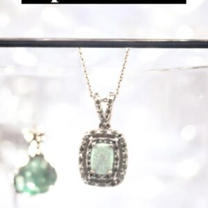 Opal Center Stone with White Zircon Halo Design in Sterling Silver Opal Platinum Jewelers MS