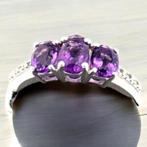 Oval Amethyst with White Topaz Accents Ring Amethyst Platinum Jewelers MS