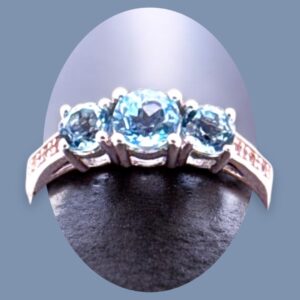 0.67 Carat Round Swiss Blue Topaz with White Topaz Accent 3 Stone Sterling Silver Ring Blue Topaz Platinum Jewelers MS
