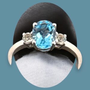 1.51 Carat Oval Swiss Blue Topaz and White Topaz Sterling Silver Ring Blue Topaz Platinum Jewelers MS