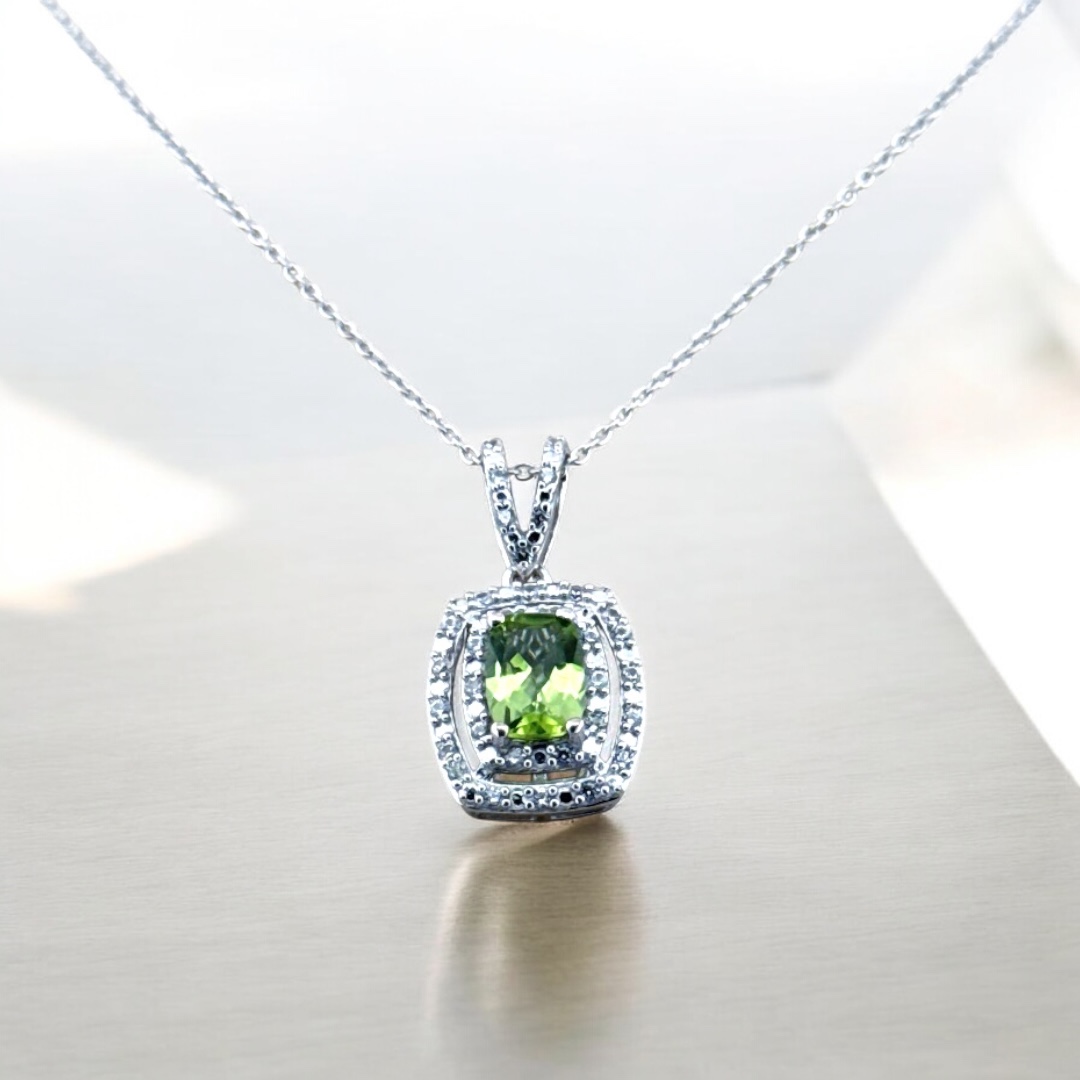 Peridot Center Stone with White Zircon Halo Design in Sterling Silver Peridot Platinum Jewelers MS Peridot Center Stone with White Zircon Halo Design in Sterling Silver Peridot Platinum Jewelers MS