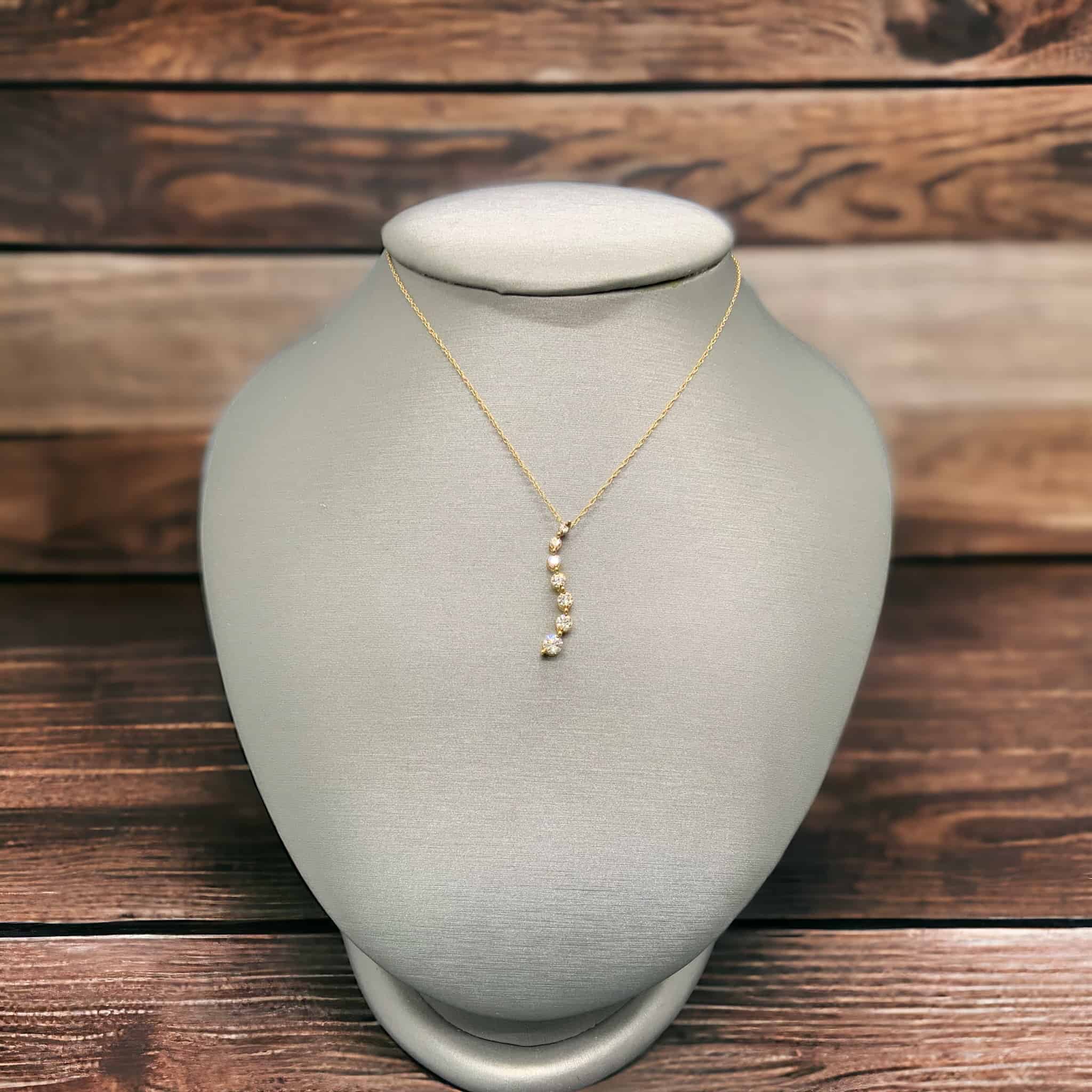 14kt Yellow Gold Diamond Curve Pendant Diamond Fashion Platinum Jewelers MS 14kt Yellow Gold Diamond Curve Pendant