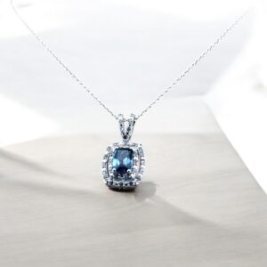 Blue Topaz Center Stone with White Zircon Halo Design in Sterling Silver Blue Topaz Platinum Jewelers MS