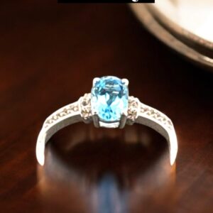 1.02 Carat Swiss Blue Topaz with White Topaz Accent Stones in Oval Center Design Sterling Silver Ring Blue Topaz Platinum Jewelers MS