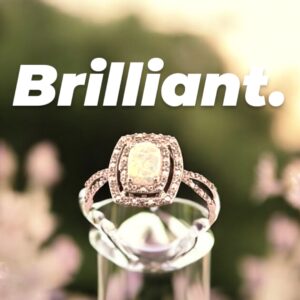 Opal Center Stone with White Zircon Halo Design in Sterling Silver Opal Platinum Jewelers MS