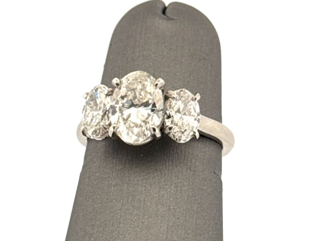Custom three stone oval engagement ring created in Byram MS