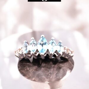0.81 Carat Marquise Swiss Blue Topaz with 0.11 White Topaz Accent Sterling Silver Ring Blue Topaz Platinum Jewelers MS